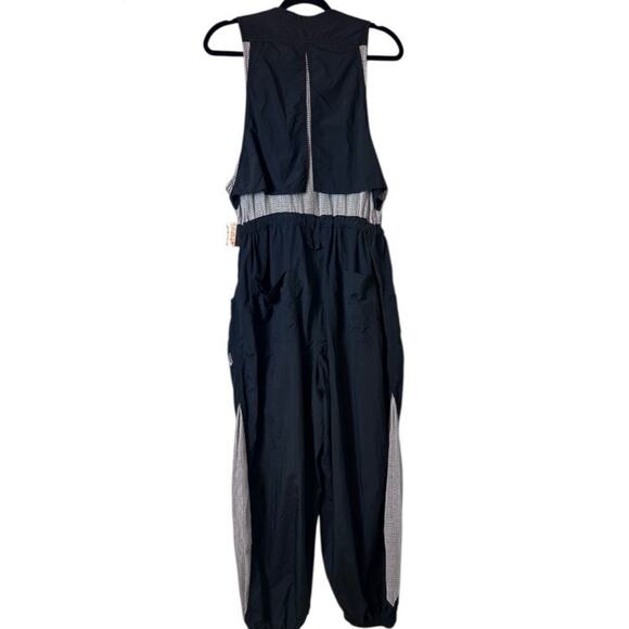 Free People Movement Inhale Jumpsuit Black
Nylon Cargo Mesh One Piece Small - Picture 4 of 7